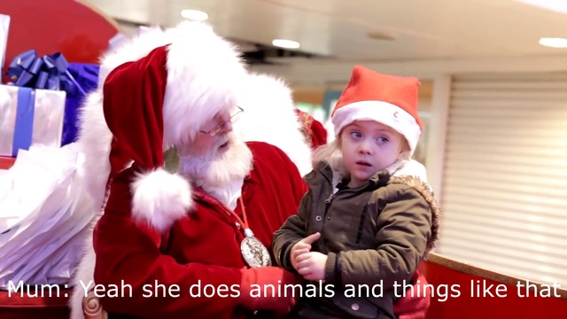 Видеото което ще докосне сърцето ви! Дядо Коледа с глухонямо момиченце